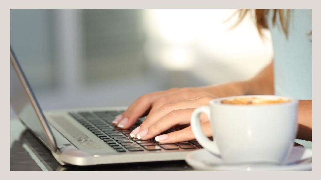 laptop with person typing